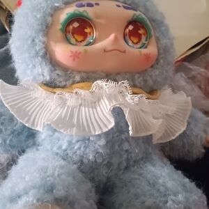 Adorable Blue Plush Doll with Ruffled Collar